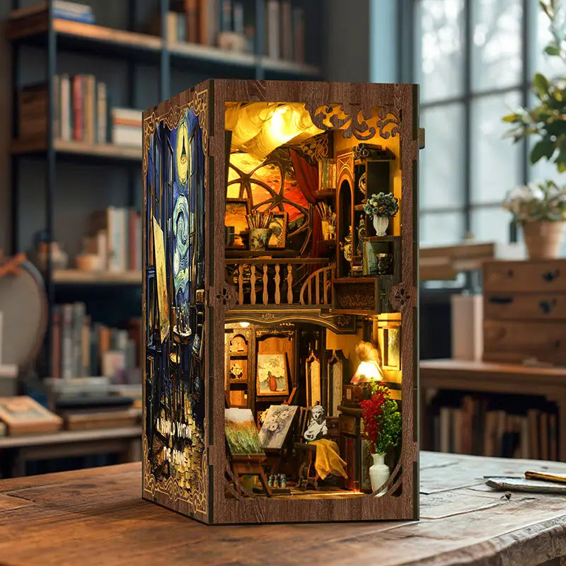 Miniature world scene in Van Gogh frame: wooden dollhouse with carved artist studio