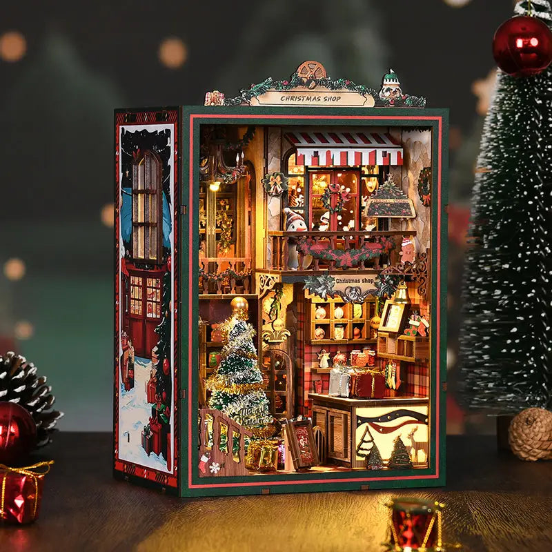 Miniature Christmas shop book nook kit with warm lit diorama and tree