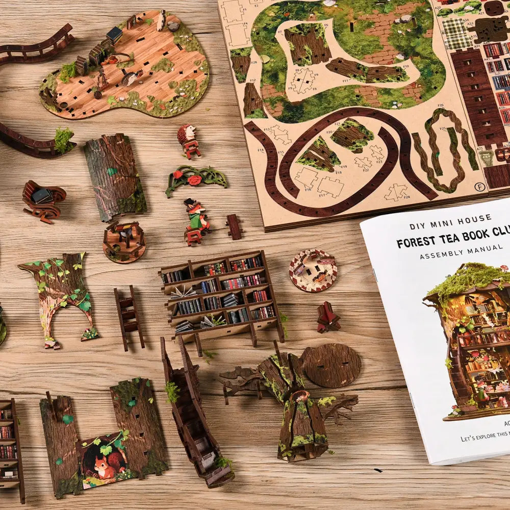 Wooden forest tea book club miniature kit with intricate tree trunk details mossy green accents and led lighting