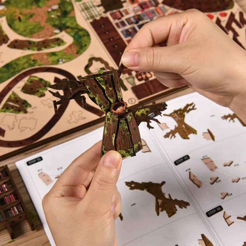 Forest tea book club diy miniature book nook kit featuring an intricate wooden tree model with mossy green tones and hollow center