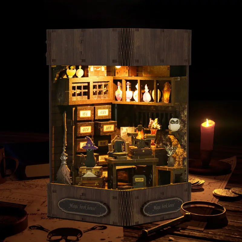 Magic book house diorama with witch in purple hat and potion shelves