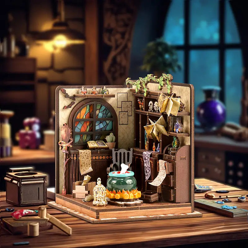 Cozy wooden diorama of cluttered wizards study in Magic Potion Workshop Book Nook Kit