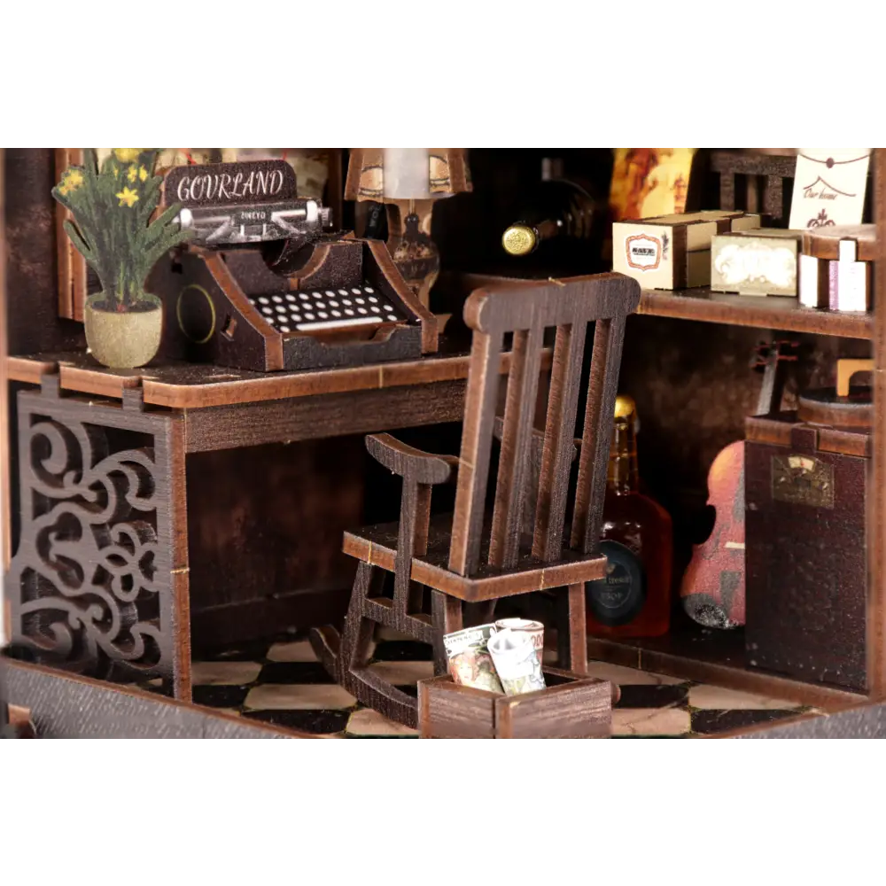 Miniature detective agency book nook with dark brown wooden rocking chair