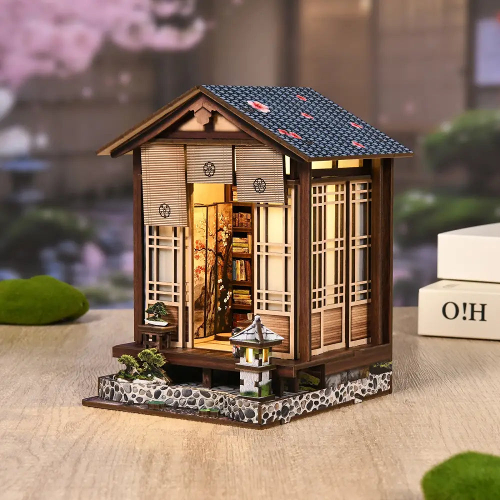 Japanese-style miniature wooden dollhouse with blue patterned roof bamboo shoji screens and led light in moss-lantern harmony australia