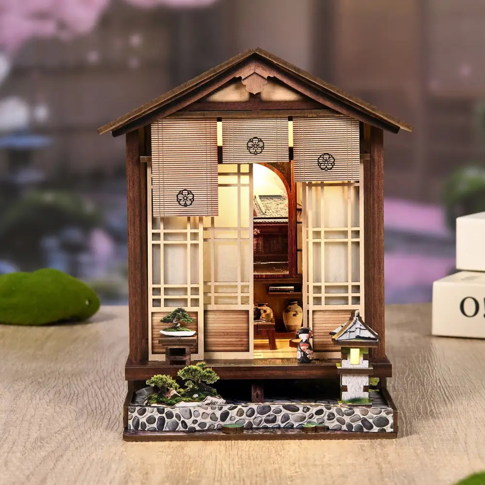 A miniature wooden japanese-style moss lantern harmony with sliding shoji doors and led light perfect for australia homes