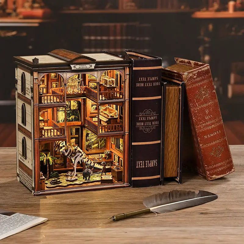 Museum of Ancient Wonders Book Nook diorama with dinosaur skeleton in wooden book