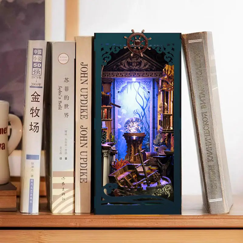 Teal shipwreck book nook with glowing orb in deep sea mystery scene