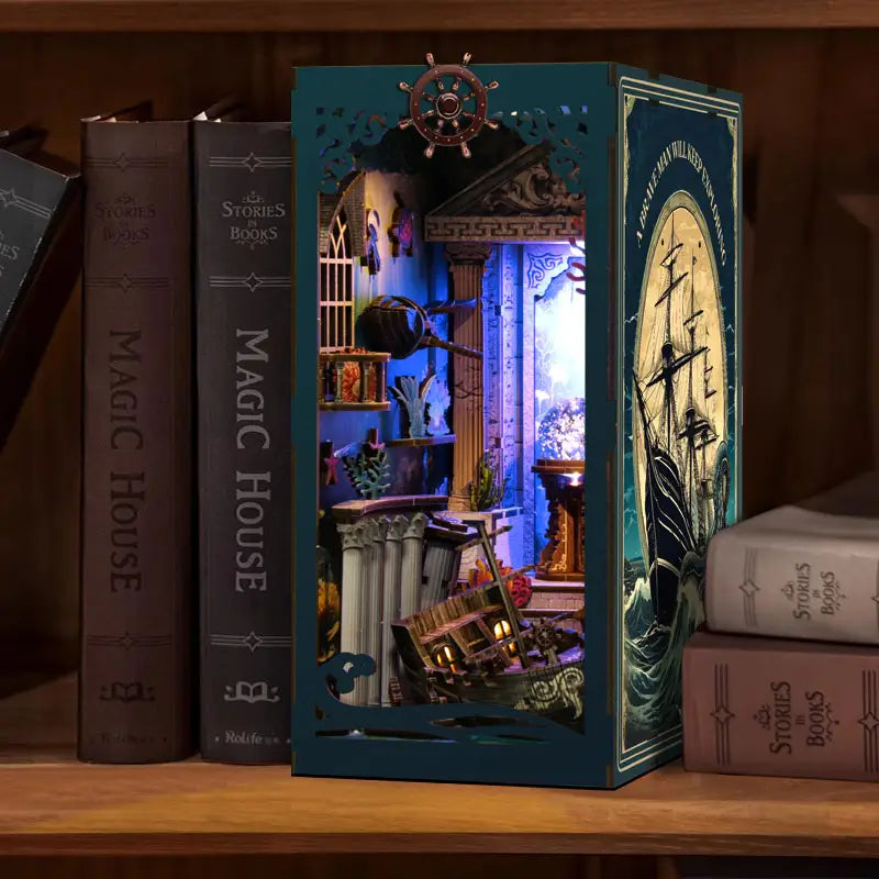 Teal book nook diorama of deep sea mystery shipwreck with cutout details
