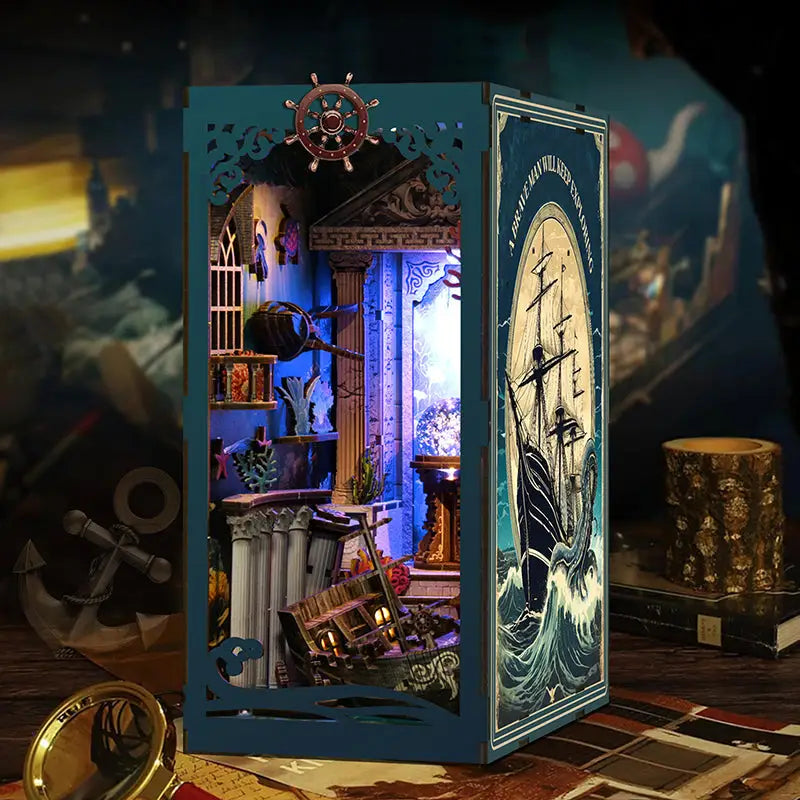 Teal pirate book nook diorama with deep sea mystery ship wheel