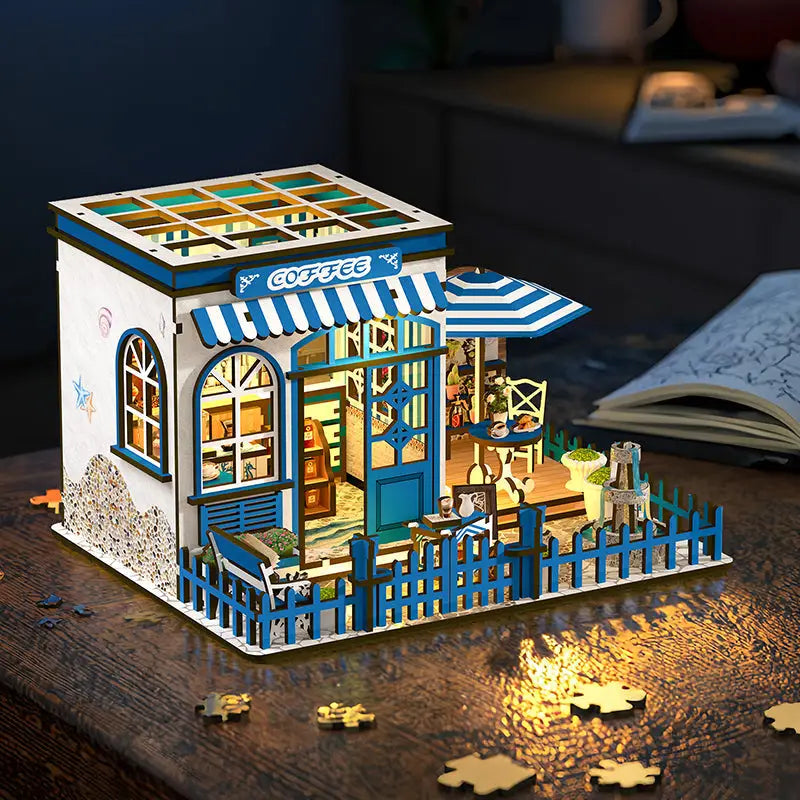 Santorini Coffee Book Nook Australia: blue white striped awning coffee cart diorama